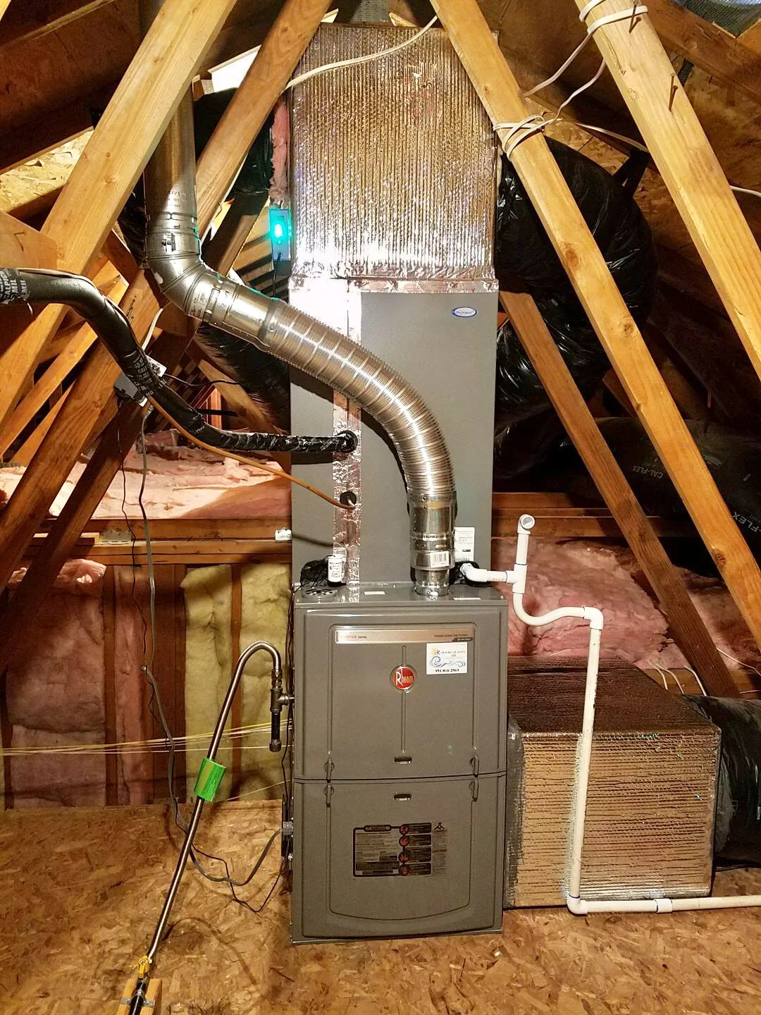 New Rheem furnace installed in an attic